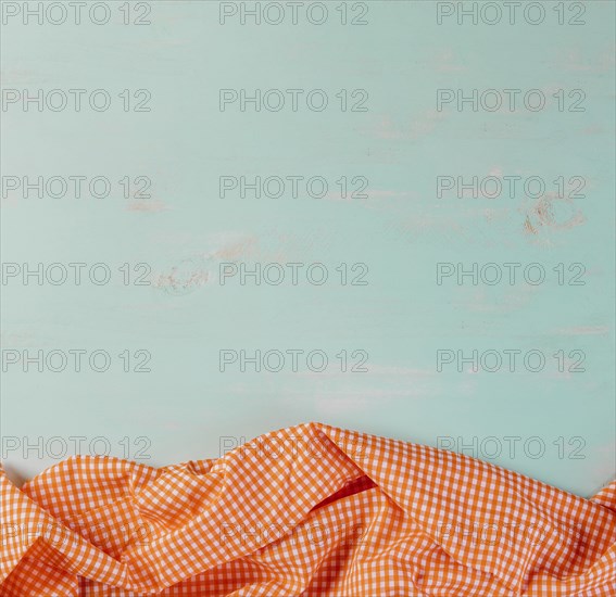 Checkered tablecloth blue background