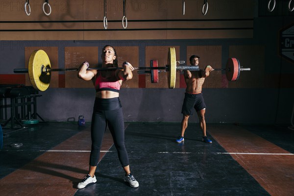 Couple doing bodybuilding