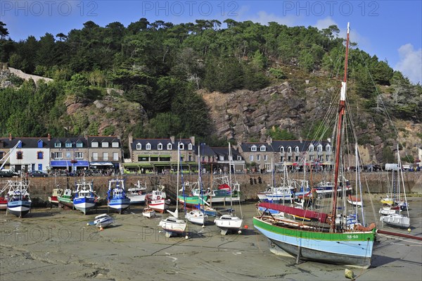 Colourful fishing boats in the harbour of Erquy
