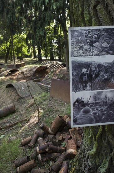 Piles of rusty shells and remains of First World War One trench at the Hooge Crater