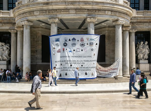 Protest posters banners outside Palacio de Bellas Artes