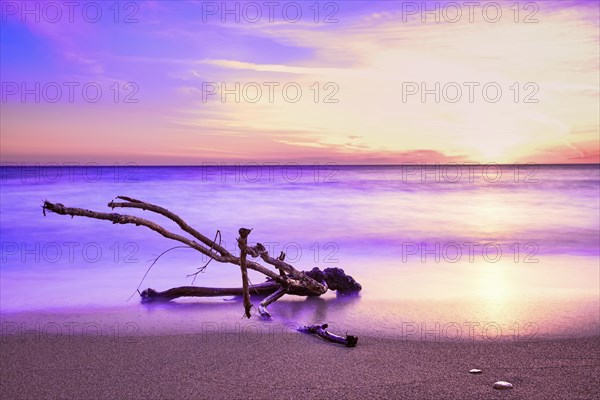 Sunset on sandy beach