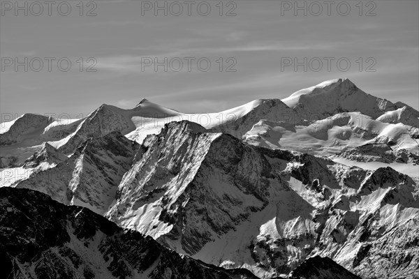 The Grossvenediger with glacier in the Hohe Tauern National Park in autumn with fresh snow