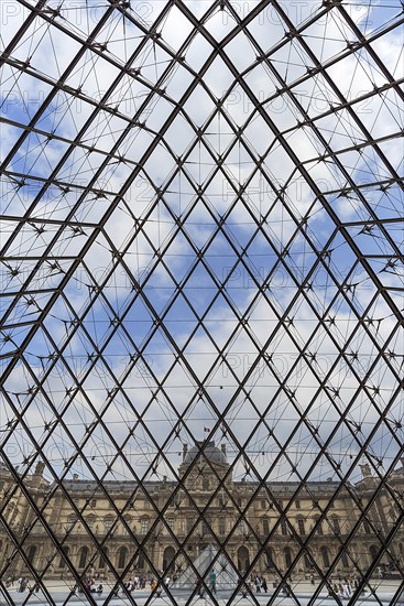 View from inside the pyramid to the buildings of the Louvre