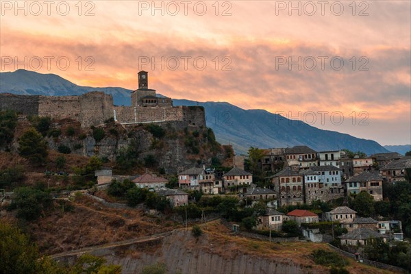 Sunset over the clock tower and Gjirokaster fortress
