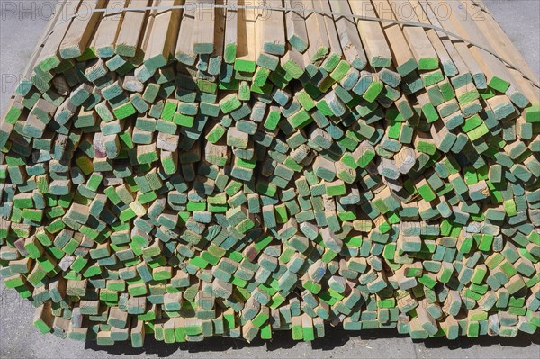 Bundled wooden slats in a sawmill