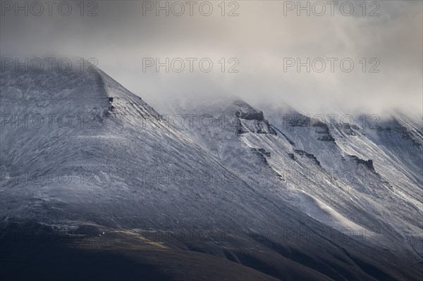 Fresh snow on mountain slopes