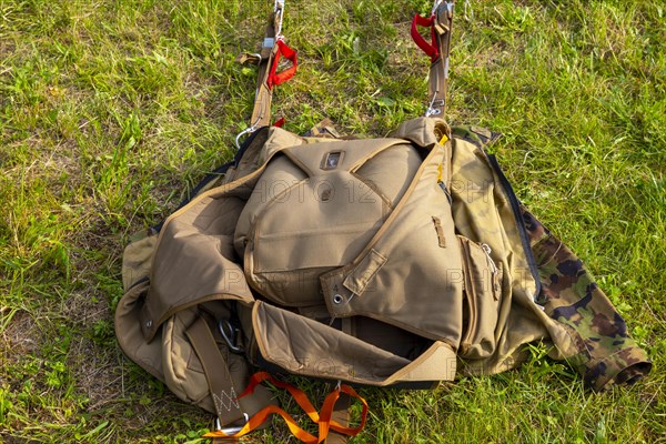 Military Parachute on the Grass in Switzerland