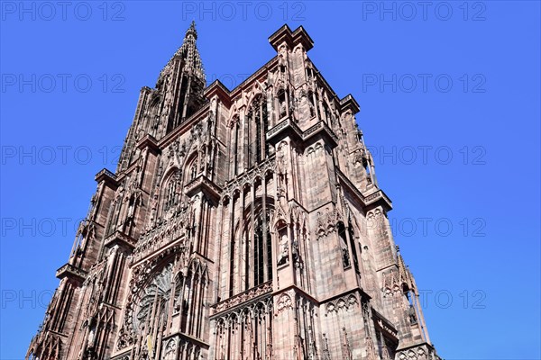 Tower of famous Strasbourg Cathedral in France in romanesque and gothic architecture style