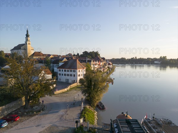 Riverbank promenade and town aerial view