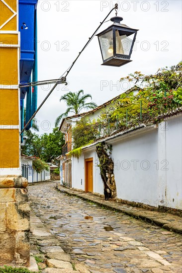 Street in the old city of Paraty on the coast of Rio de Janeiro with its colonial-style houses and cobblestone streets