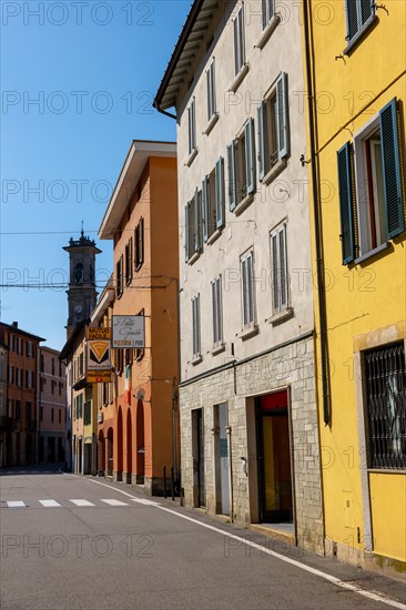 City Street in Porto Ceresio and Church Tower in a Sunny Summer Day in Porto Ceresio