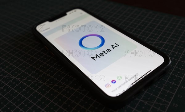 In this photo illustration a person browsing Meta AI
