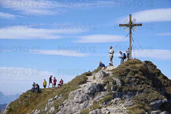 Hiker at the summit of the Grosse Klammspitze