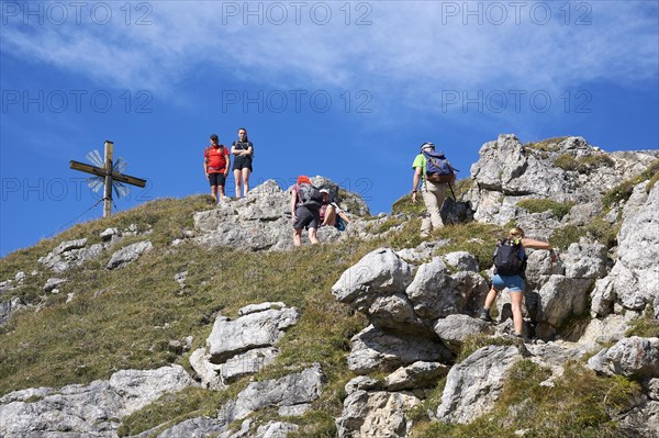 Hiker at the summit of the Grosse Klammspitze
