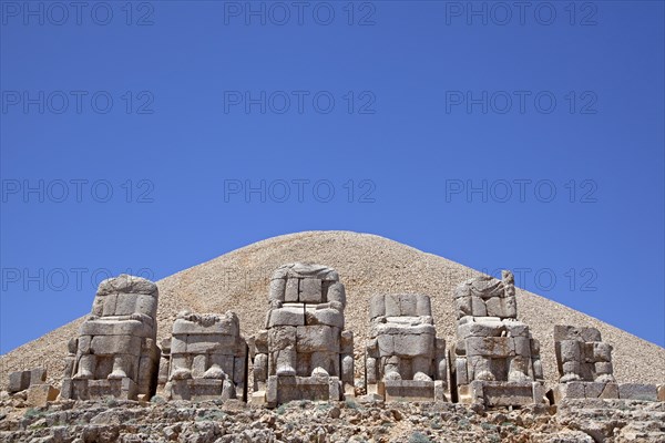 Broken statues of thrones at the East Terrace at Mount Nemrut