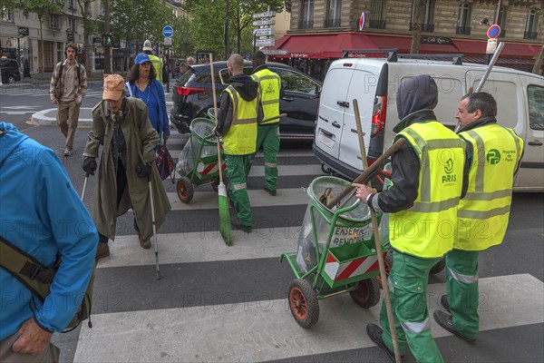 Morning city cleaners on the streets