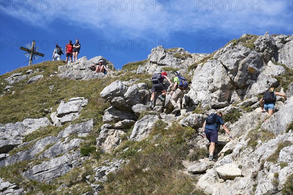 Hiker at the summit of the Grosse Klammspitze