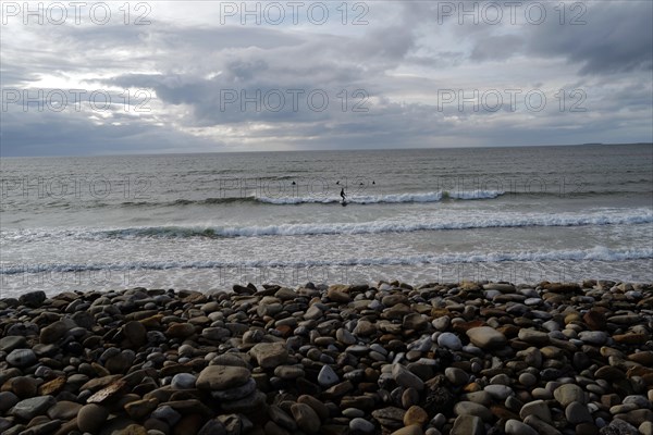 Surfers enjoy the waves along the Wild Atlantic way. Strandhill