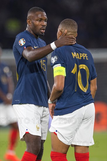 Marcus THURAM France caring for Kylian MBAPPE France re
