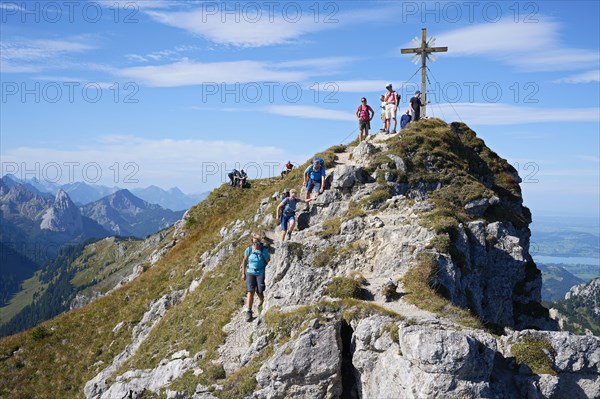 Hiker at the summit of the Grosse Klammspitze