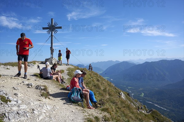 Hiker at the summit of the Grosse Klammspitze