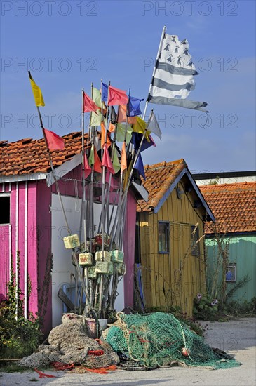 Colourful cabins of oyster farmers in the harbour at Le Chateau-d'Oleron on the island Ile d'Oleron