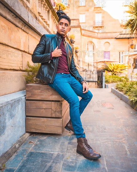Trendy lifestyle of a Latino guy in the city. Jeans