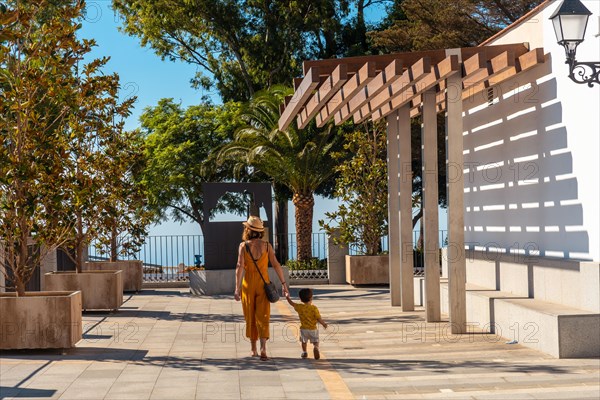 A young mother with her son in the municipality of Mijas in Malaga. Andalusia