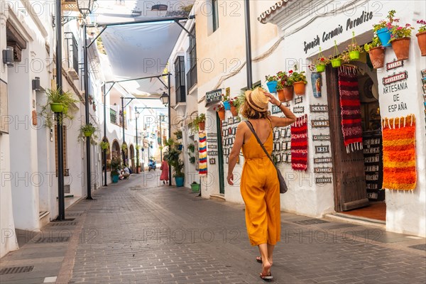 A tourist in the white houses walking and visiting the municipality of Mijas in Malaga. Andalusia