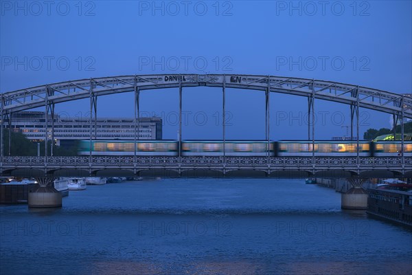 Evening view of the Viaduc d'Austerlitz with moving Metro
