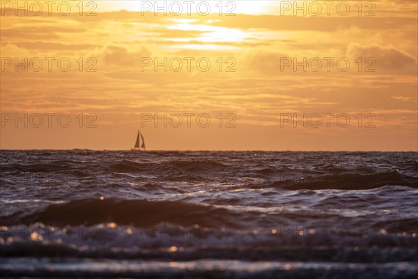 Sunset on the beach of De Panne
