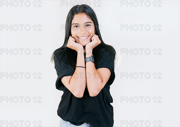 Portrait of friendly latin girl smiling isolated. Close up of Latin American girl face looking and smiling at the camera. Young Nicaraguan woman smiling at camera