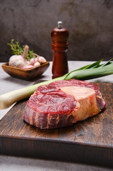 Raw juicy beef shank cross-cut. Ossobuco beef steak