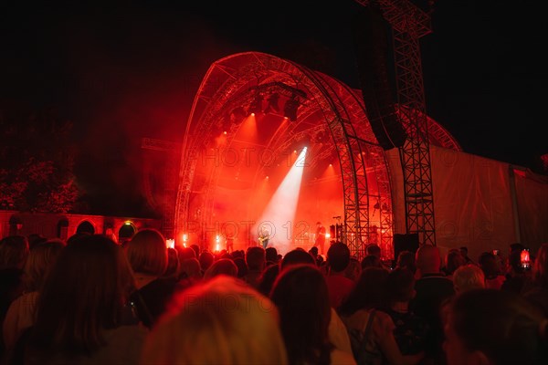 Crowd at Live Klostersommer Festival in Historic Monastery