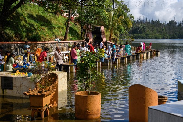 Devout Hindus make sacrifices to Hindu deities Religious site largest Hindu sanctuary Sanctuary for religion Hinduism outside India for devout Hindu Hindus Saint lake Crater lake Grand Bassin Ganga Ta...