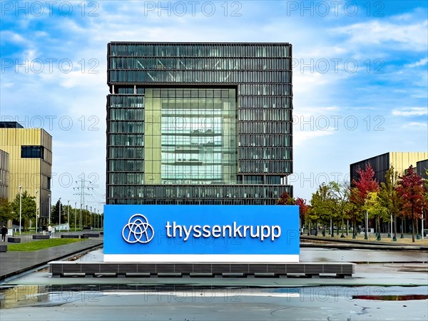 View of headquarters in the background in the form of cube of steel giant company of steel production manufacturer of steel thyssenkrupp Thyssen Krupp in the foreground logo and lettering