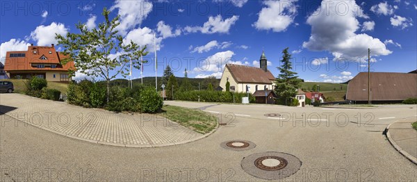 Oberbiederbach pilgrimage church with the Biederbach through-road