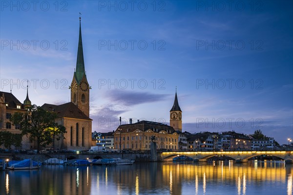 Fraumünster and St. Peter's Church at dusk