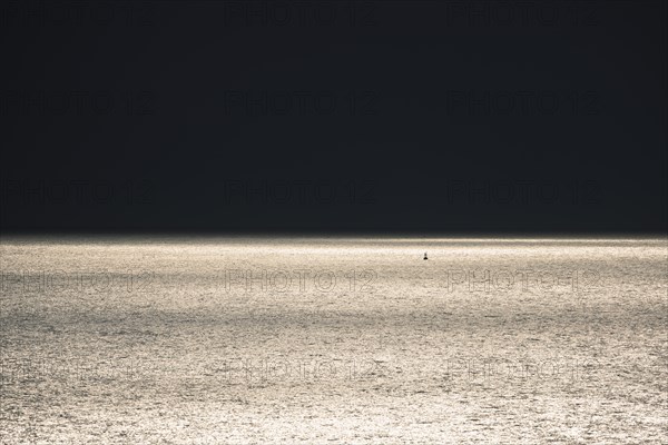 Dark clouds and sunlight over the North Sea