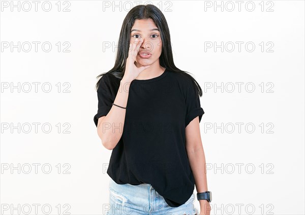 Girl whispering to the camera