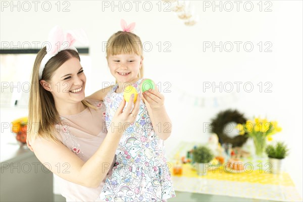 Cheerful woman girl with eggs
