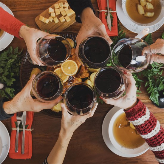 Christmas dinner with top view wine glasses
