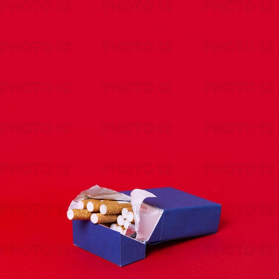 Pack cigarettes with red background
