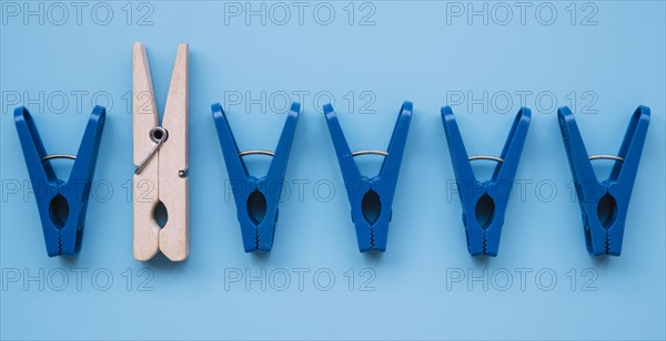 Flat lay plastic clothespins wooden one