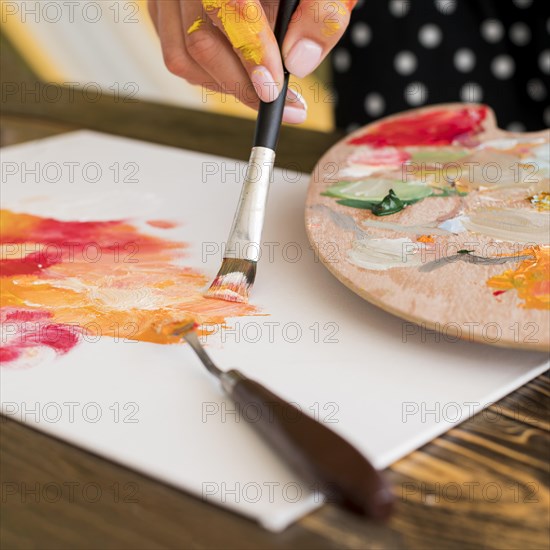 High angle artist painting