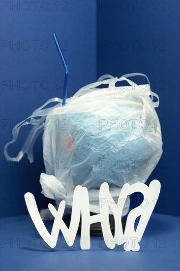 Front view earth globe covered plastic with why