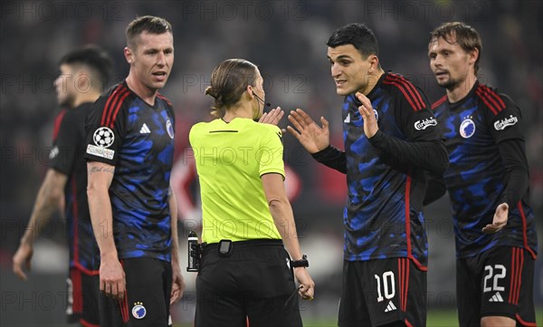 Referee Stephanie Frappart in discussion with Denis Vavro FC Copenhagen
