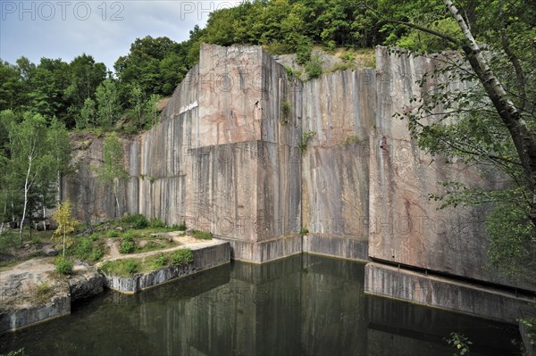 The abandoned red marble quarry Carriere de Beauchateau at Senzeilles in the Belgian Ardennes