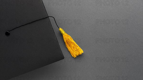 Top view academic cap with copy space